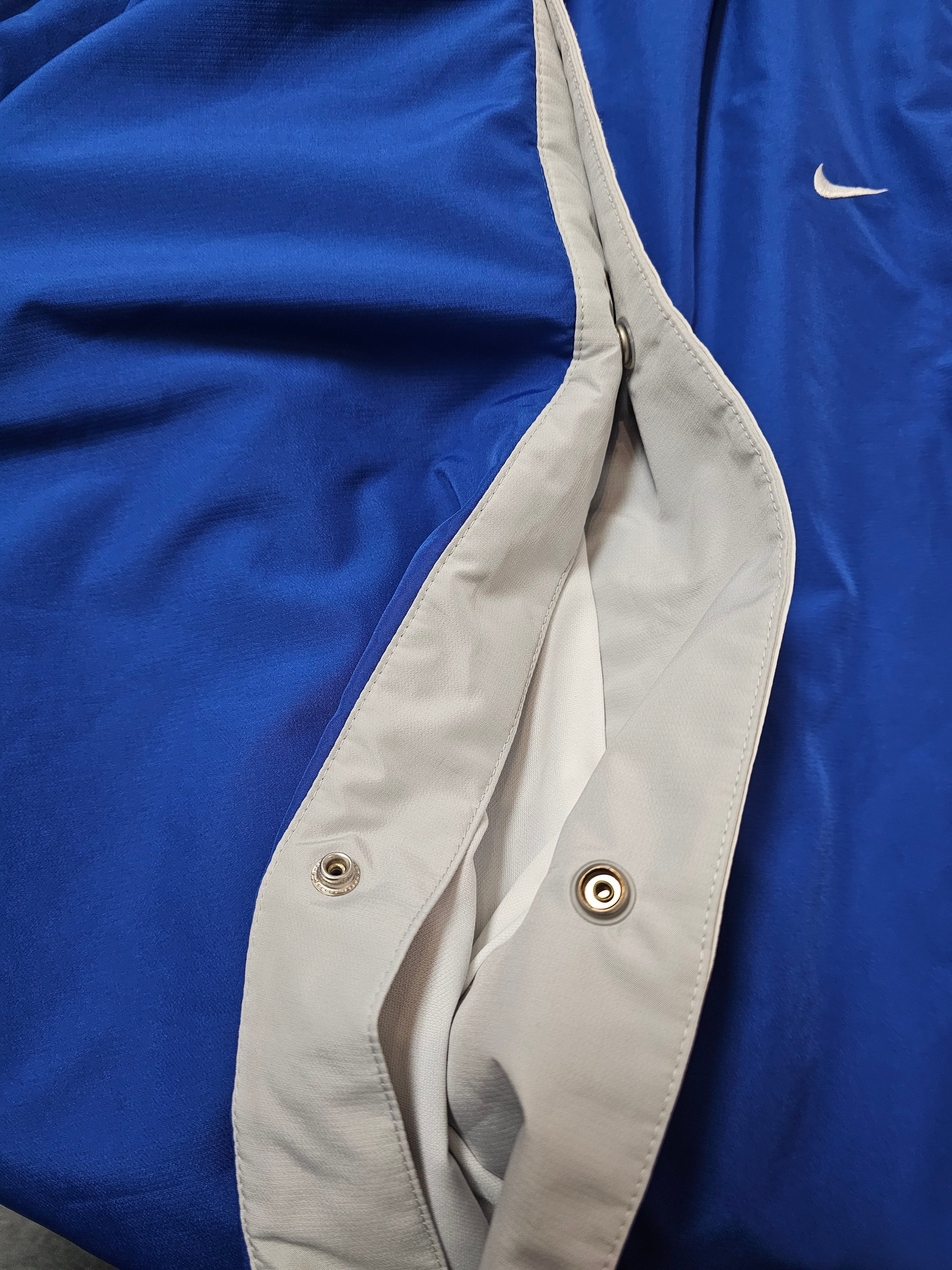 Vintage Nike blue white nylon side buttons track pants